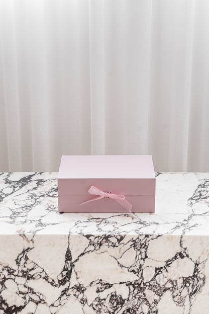 Pink magnetic gift box with ribbon by Unbox Me