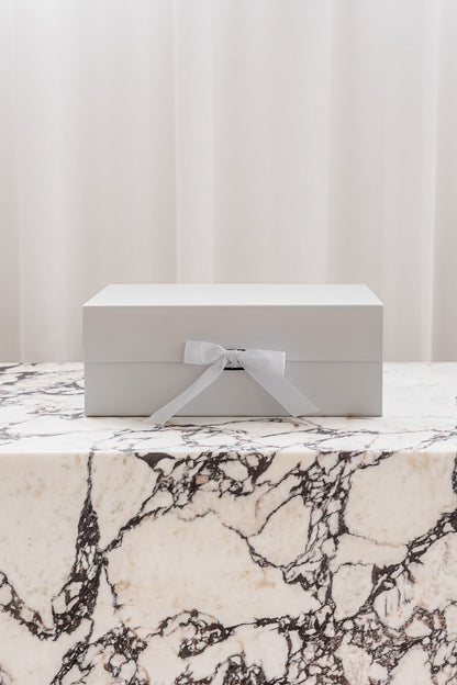 White magnetic gift box with ribbon by Unbox Me